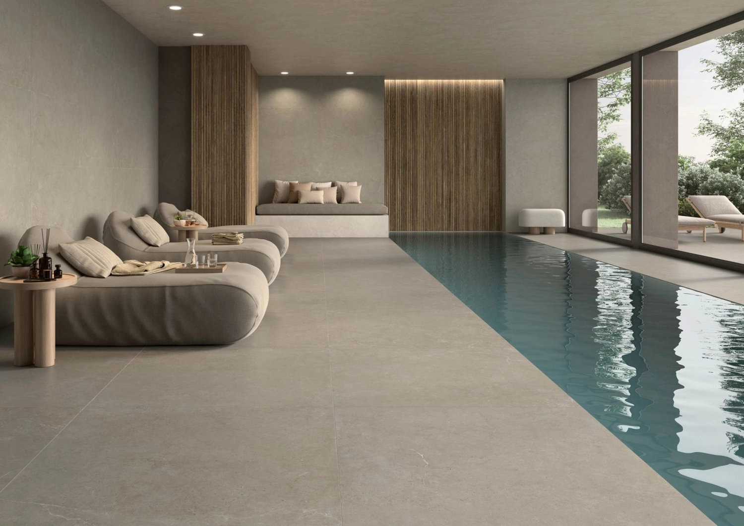 Percoco-Granit – Feinsteinzeug Fliesen – Das Bild zeigt einen Innenpoolbereich mit Nereidi Feinsteinzeugfliesen von Energieker.